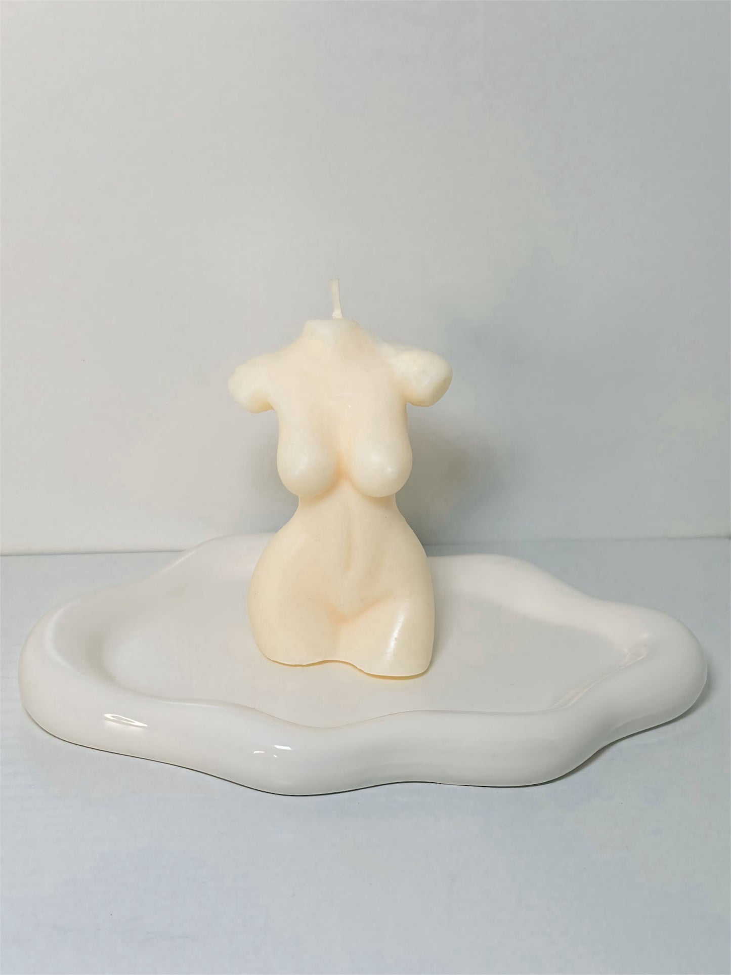 Female body torso candle